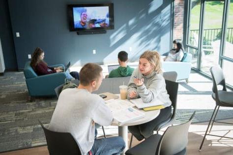 Students study and talk in the common area of a renovated Presidents Row residence hall as seen October 21, 2019年在华盛顿的Creosote影响照片拍摄期间 & Jefferson College.